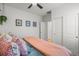 This cozy bedroom has neutral walls, plush bedding, and is conveniently located near a closet and bathroom at 8132 Mt Harvard Rd, Littleton, CO 80125