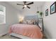 Light filled bedroom featuring neutral walls, plush bedding, and decorative accents for a serene atmosphere at 8132 Mt Harvard Rd, Littleton, CO 80125