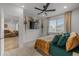 Bedroom with a window, TV, and warm accents for a cozy and inviting retreat at 8132 Mt Harvard Rd, Littleton, CO 80125