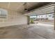 Spacious two-car garage with a view of the surrounding neighborhood from the open garage door at 8132 Mt Harvard Rd, Littleton, CO 80125