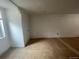 Spacious unfinished basement, featuring tile flooring and a small built in closet at 2771 W 1St Ave, Denver, CO 80219
