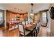 Open concept dining area, adjacent to the kitchen, offers a spacious layout perfect for entertaining and Gathering dinners at 237 Dayton St, Denver, CO 80230