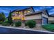 Attractive home featuring classic design elements and professionally landscaped yard at 237 Dayton St, Denver, CO 80230