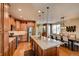 Bright kitchen with a large island, stainless steel appliances, and an open layout flowing into the dining area at 237 Dayton St, Denver, CO 80230