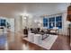 Spacious living room featuring hardwood floors and a comfortable seating area at 237 Dayton St, Denver, CO 80230
