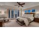 Main bedroom with a ceiling fan, seating, and natural light at 237 Dayton St, Denver, CO 80230