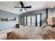 Serene bedroom with a comfortable bed, balcony access, and soft natural light at 237 Dayton St, Denver, CO 80230