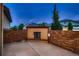 Outdoor brick patio featuring a unique vintage brick fireplace and a concrete floor at 237 Dayton St, Denver, CO 80230