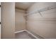 Walk-in closet includes carpeted flooring and built-in wire shelving for optimal storage at 237 Dayton St, Denver, CO 80230