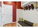 Cozy entryway with wainscoting, a built-in bench, and hat hooks at 2948 Open Sky Way, Castle Rock, CO 80109