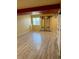 Spacious basement with wood-look flooring, a window, and recreational fixtures at 21742 E Lehigh Pl, Aurora, CO 80018