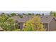 Overhead view displays a peaceful neighborhood with tree-lined streets at 21742 E Lehigh Pl, Aurora, CO 80018