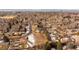 Aerial view of a large lot in a well-established neighborhood with city views at 434 S Newport Way, Denver, CO 80224