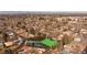 An aerial view shows the parcel of land with a green overlay in a neighborhood setting at 434 S Newport Way, Denver, CO 80224