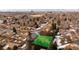 An aerial view shows the parcel of land with a green overlay in a neighborhood setting at 434 S Newport Way, Denver, CO 80224