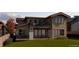 Back exterior showcasing a deck, balcony, and backyard at 1020 24Th St, Golden, CO 80401