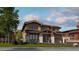 Two-story craftsman style home with stone accents and a large front yard at 1020 24Th St, Golden, CO 80401