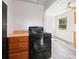 Kitchen view featuring range and wood cabinets at 1941 S Dexter St, Denver, CO 80222