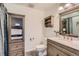 Elegant bathroom with updated vanity and tiled shower at 1950 N Logan St # 807, Denver, CO 80203