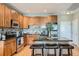 Modern kitchen featuring stainless steel appliances and an island at 1950 N Logan St # 807, Denver, CO 80203