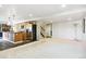 Spacious basement area with a kitchenette, stairs, and potential for customization at 1563 Baguette Dr, Castle Rock, CO 80108