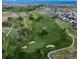Aerial view of the golf course showcasing the scenic layout and surrounding residential area at 4408 Riviera Ct, Aurora, CO 80019