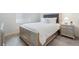 Bedroom features a comfortable bed, carpet, and a neutral color scheme at 4408 Riviera Ct, Aurora, CO 80019