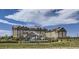Hotel featuring large windows, many rooms and floors, and an impressive architectural design at 4408 Riviera Ct, Aurora, CO 80019