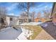 Backyard view showcasing grass, shed, and mature tree at 7505 Clay St, Westminster, CO 80030