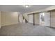 Spacious basement with neutral carpeting and ample storage at 7505 Clay St, Westminster, CO 80030