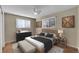 Spacious bedroom with wood floors and ceiling fan at 7505 Clay St, Westminster, CO 80030