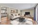 Bright living room with hardwood floors and open concept design at 7505 Clay St, Westminster, CO 80030