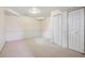 Basement space featuring neutral carpeting and traditional decor elements at 1479 S Jasper St, Aurora, CO 80017