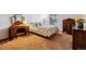Cozy bedroom with a large window and classic furniture, creating a comfortable retreat at 1479 S Jasper St, Aurora, CO 80017