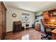 Comfortable bedroom with a work desk and a wooden roll-top desk at 1479 S Jasper St, Aurora, CO 80017