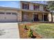 Charming two-story home with a well-manicured lawn, and a welcoming front porch at 1479 S Jasper St, Aurora, CO 80017