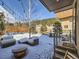 Inviting backyard with outdoor seating and a lovely view at 28665 Tepees Way, Evergreen, CO 80439