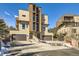 Stunning modern home featuring clean lines, balconies, and two garages, perfect for stylish living at 28665 Tepees Way, Evergreen, CO 80439