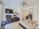 Spacious primary bedroom with a neutral palette, large windows for natural light, and modern decor at 28665 Tepees Way, Evergreen, CO 80439