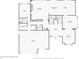 A detailed floor plan of the first floor, showcasing the layout of the living spaces, kitchen, and garage at 11911 E Lake Cir, Greenwood Village, CO 80111
