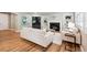 Comfortable living room featuring a fireplace, built-in shelving, and sleek furniture at 11911 E Lake Cir, Greenwood Village, CO 80111