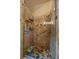Updated shower with tiled walls, a glass door, and a shower seat at 3065 Piney Ridge Rd, Evergreen, CO 80439