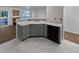 Kitchen sink and countertops overlooking the living room at 1256 S Zeno Cir # E, Aurora, CO 80017