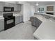Kitchen with granite countertops and gray cabinets at 1256 S Zeno Cir # E, Aurora, CO 80017