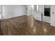 Spacious living room features hardwood flooring and ample natural light at 1256 S Zeno Cir # E, Aurora, CO 80017