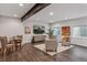 Stylish finished basement with a seating area and bar at 1373 S Garfield St, Denver, CO 80210