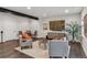 Finished basement with seating, TV and modern finishes at 1373 S Garfield St, Denver, CO 80210