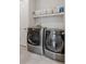 Modern laundry room featuring new LG washer and dryer at 1373 S Garfield St, Denver, CO 80210
