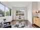 Bright office space with hardwood floors, large windows, and neutral decor at 1373 S Garfield St, Denver, CO 80210