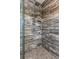 Bathroom shower showcases sleek and stone tile, multiple shower heads, and built-in storage at 1373 S Garfield St, Denver, CO 80210